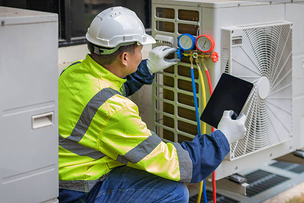 Professional Air Duct Cleaning technician working in Alleman, IA